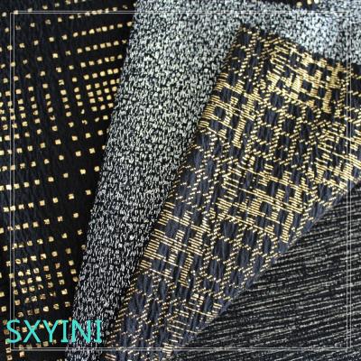 China Wholesale High Quality Shaoxing YINI 97% Stretch Polyester 3% Spandex Gold Foil Printing Fabric Te koop