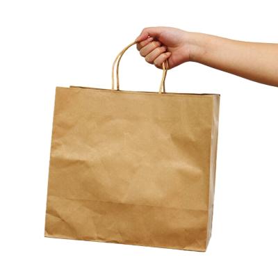 China Eco - Friendly Recycled Materials OKCARTON Brown Paper Gift Bags Shopping Bag With Handles Bulk for sale