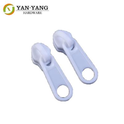 China No. 5 white color plastic zipper puller Nylon zipper for sale