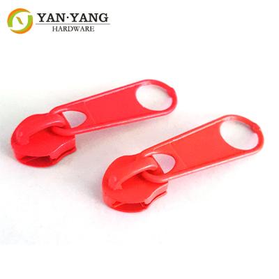 China No. 5 red color plastic zipper puller Nylon zipper multi-color optional for sale