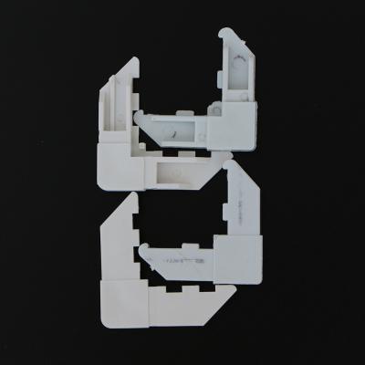 China Modern Cheap Price Plastic Accessories For Windows Doors Hardware /Plastic L Corner For Windows for sale