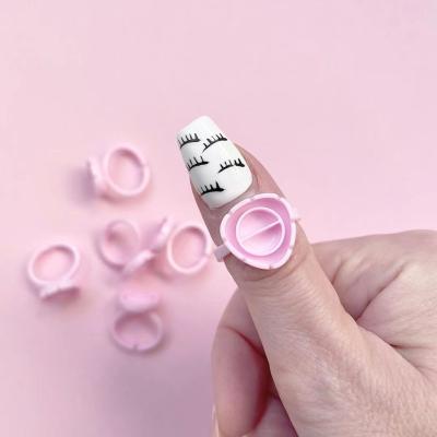 China New Eyelash Extension Tools Flower Glue Ring For Plastic Eyelash Extensions With 100 Pieces One Bag for sale