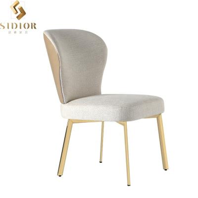 China Cooling Luxury Dining Chair Matte Cloth Rice White Back Modern Dining Chairs for sale