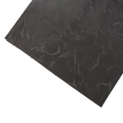 China Embossed good quality 75D waterproof 100% polyester imitated memory fabric PU coating waterproof fabric for garment for sale