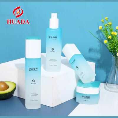 China Cosmetic Square High Fashionable Purple Packaging Cosmetic Empty Glass Bottle Set For Lotion Serum Cream for sale