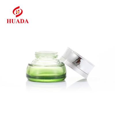 China Wholesale Green Cosmetics Glass Cream Bottle Oil Pump Pressure Packaging Skin Care Glass Bottle Bottle Cosmetics for sale