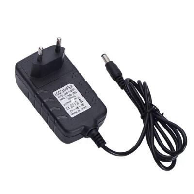 China 24v2a 24v2a 242000Q Power Adapter 24v48w Machine Nail Light LED Fill Light Charger Phototherapy Power Supply for sale