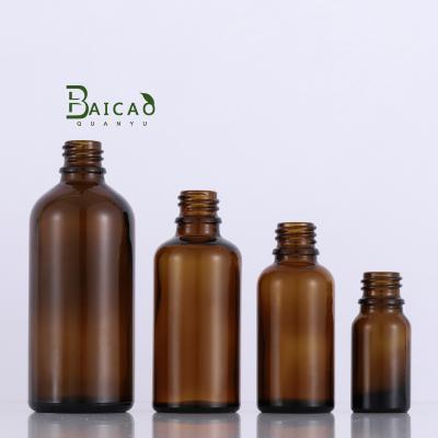 China Universal Packaging Lid 10ml Oil Bottle 30ml Aliquot Gold Amber Essential Glass Bottles Glass Bottle for sale