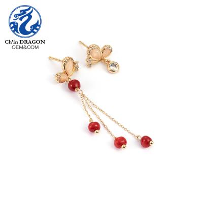 China Latest Wedding Garnet Earring Fashion CLASSIC Butterfly Shape Red Gold Filled Indian Jewelry Earrings for sale