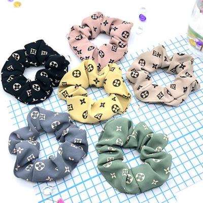 China Protect Women's Hot Jewelry Fashion Brand Trend Hair Circle Designer Scrunchies Link Band Band Accessories for sale