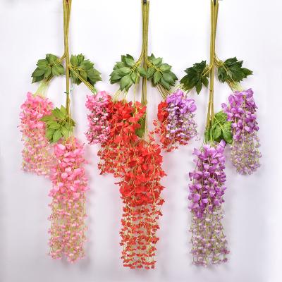 China High Simulation DREA 110cm Artificial Wisteria Vine Hanging 12 Bundles Silk Flowers for Wedding Garden Decor for sale