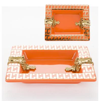 China Asian Zen ceramic Christmas decorations rectangular with copper handle orange color ashtrys with custom logo for sale