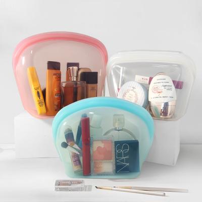 China Fashion Waterproof Self-Sealing Makeup Bag Women Cosmetic Storage Bag Reusable Gift Fashionable Silicone Bag for sale