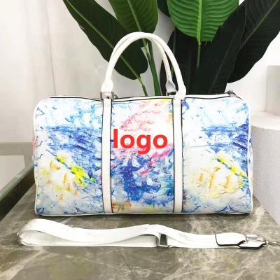 China Fashion luggage bags 2023 new arrival leather duffel bag designer handbags famous brands handbags for women luxury duffel travel bag for sale