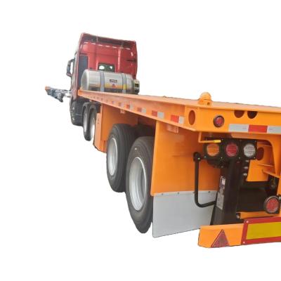 China Beste prijs 40T-100T platbed laagbed half-trailer 3-assige skelet half-trailer voor containervervoer Te koop