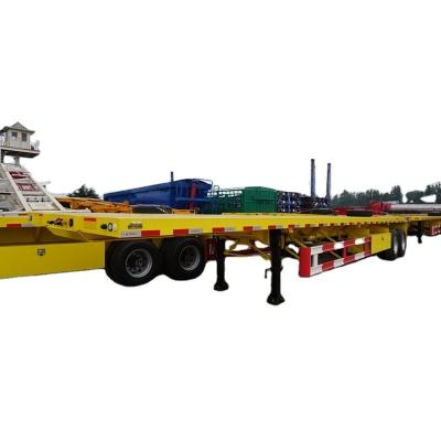 China 4-Axle Flatbed Shipping Container Semi Trailer With Nice Twistlocks Utility Steel Flatbed Semi Trailer for sale