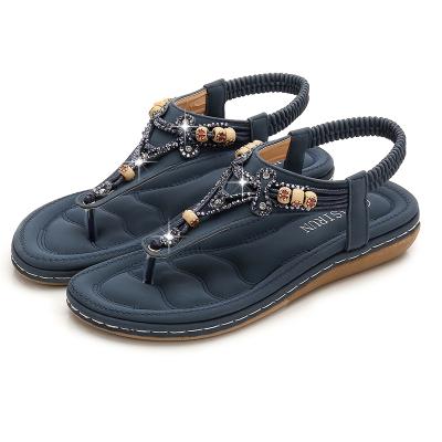 China Fashion Trend Comfortable Bohemian Beach Shoes Elastic Strap Flats Sandals For Women for sale