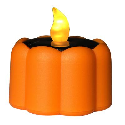 China Halloween Decor Rechargeable Solar Pumpkin Shape Candle Light Yellow Flashing Lamp for sale