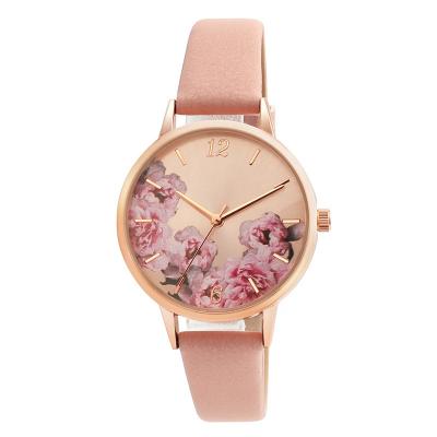 China Fashionable polished PU leather strap gold case alloy lady watch flower waterproof elegant style new for sale