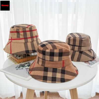 China Hot Selling Famous Brand Striped Fisherman Hat Custom 5 Color Designer Luxury Foldable Stripe Bucket Hats For Women for sale