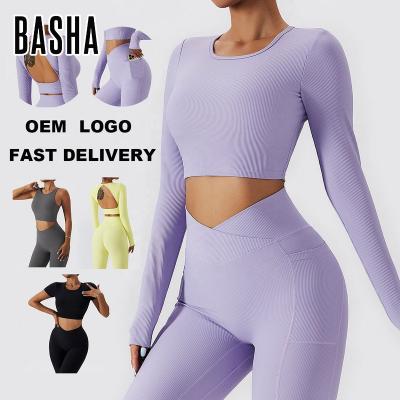 China Custom BASHAsports 2023 Crop Long Sleeve Top Antibacterial Logo Tracksuit Set Shorts Shirt Sports Bra V Waist Gaiters Pocket Ribs for sale