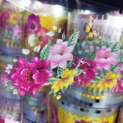 China 2019 New Design Plastic Fashionable PET Heat Transfer Material Wholesale Reflective Film With Flower For Plastic Container for sale