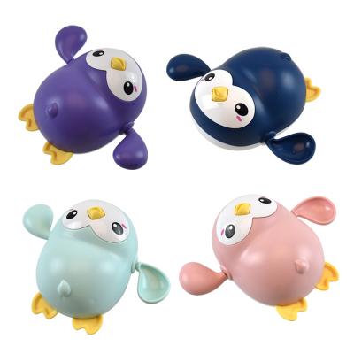 China Race Eco-friendly Material Swimming Floating Penguin For Kids Bath Toy Animal Wind Up Swimming Penguin Tub Bath Toys for sale