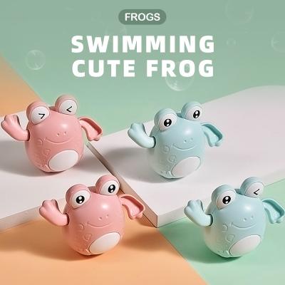 China Toy Cute Swimming Race Floating Cognitive Floating Frog For Kids Bath Toy Animal Wind Up Swimming Frog Tub Bath Toys for sale