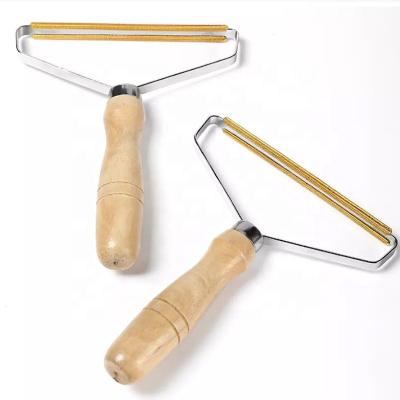 China Durable Pure Copper Double Head Blade Manual Clothes Wood Fiber Remover Handle for sale