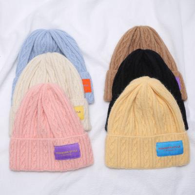 China 2021 Hot Wholesale New Product Solid Color Letter Logo Hip Hop Plain Beanie Hat COMMON for sale