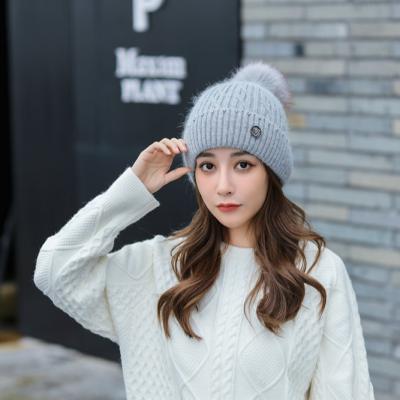 China 2021 Autumn And Winter New Design COMMON Heat With Pompoms Letter V Embroidery Women Slapped Skully Hat for sale