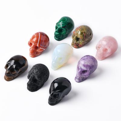 China China Quality 1.9 Inch Tall Carved Skulls Crystal Skulls Colorful Crystal Skulls Natural Stone Gem Healing Crystals for sale