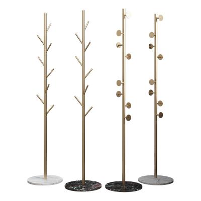 China Cheap Wholesale Modern Simple Luxury Sensitive Popular Mini Metal Coat Stand Marble Base Coat Rack for sale