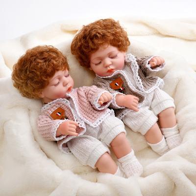 China New Mini Fashion 30cm Bathable white skin dress up vinyl simulation sleep doll reborn toys for baby dolls for girl gift for sale