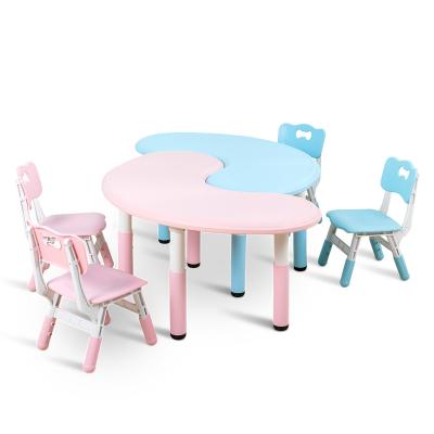 China Durable Moon Shape Functional Plastic Material Kids Height Adjustable Kids Desk And Chair Set for sale