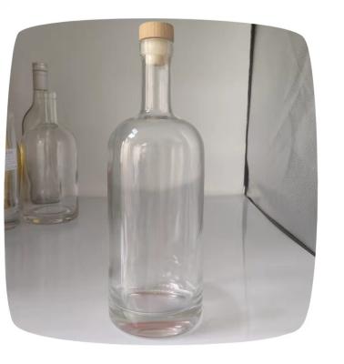 China Beverage Flint Glass Bottles Rum Juniper Liquor Glass Bottle 700ml 750ml Clear Round Vodka Bottles for sale