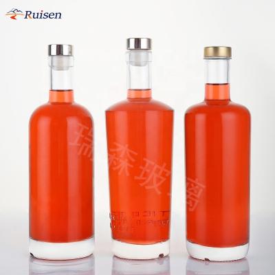 China Custom Luxury Rum Bottle Clear Vodka Wine Bottle Round Shape Beverage Bottle Empty Spirit Bottle With Cork for sale