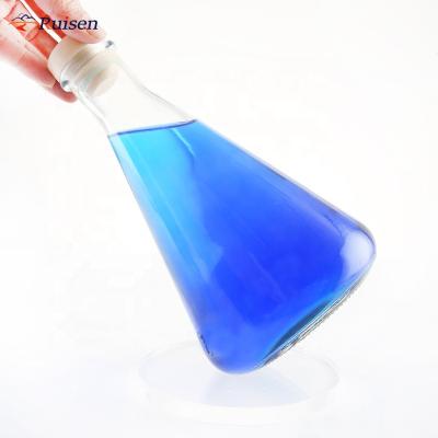 China Wholesale 700ml unique shape spirit liquor glass bottle beautifully design glass bottle for sale