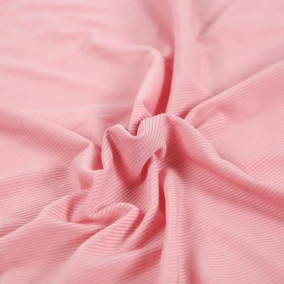 China Breathable Ribbed High Elasticity Brushed Solid Colors Knitted Fabric Spandex Swimwear Tank Top Fabric for sale