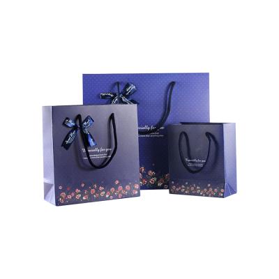 China Recycled Materials Wholesale Modern Gift Bag Ribbon Bow Bag Customization Interesting Price Folding Paper Bag For Valentine's Day for sale