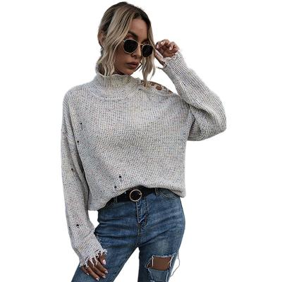 China Anti-wrinkle loose off-shoulder ripped long sleeve turtle neck knitted sweater 2021 fall pullovers sweater for women for sale