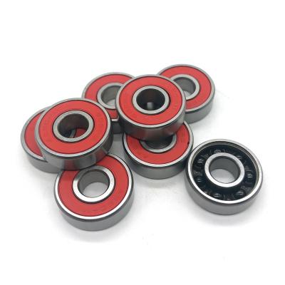 China Manufacturer High Speed ​​Original Bearing Abec 5 China Abec 7 Ceramic Built In Rings Skateboard Ball Bearing for sale