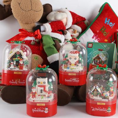 China 2021 New Arrival Non-Toxic Santa Claus Candy House Christmas Scene Christmas Music Box Building Blocks Snowman Christmas Gift For Kids for sale