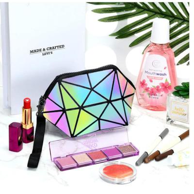 China Fashion Women Portable Holographic Luminous Cosmetic Bag Travel Zipper Geometric Reflective Makeup Bags for sale