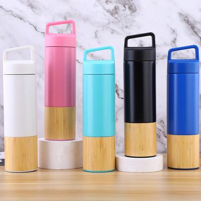 China PORTABLE Reusable Vacuum Quilting Bamboo With Lids 600ML Stainless Steel Water Bottle for sale