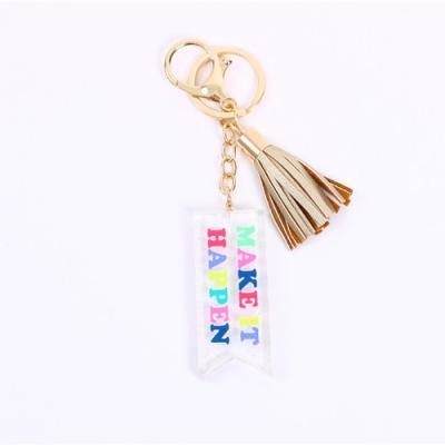 China Decoration Gift Customized Tassel Alphabet Acrylic Four-color Printed Key Chain Pendant For Bags for sale