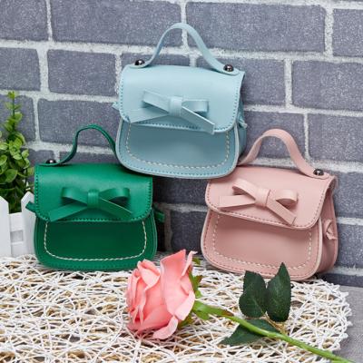 China Fashionable PU Messenger Bag Mini Vintage Sweet Bow Adjustable Handbag Child Shoulder Purse Bag High Quality for sale