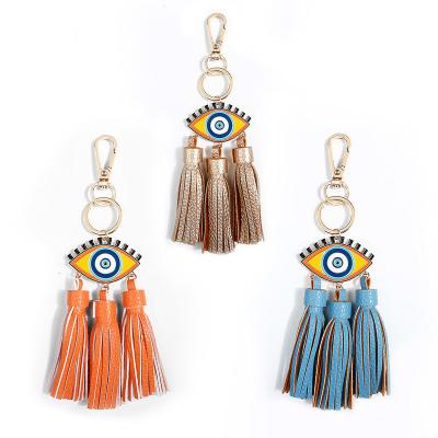 China Unisex Key Ring Jewelry Bag Charm of the Devil's Eye Paint Enamel PU Leather Tassel Oil Eye Pendant for sale