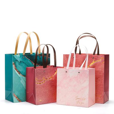 China High Quality Custom Logo Printed Materials Art Paper Recycled Gift Bags Luxury Customize Paper For Jewelry Shopping Handbags for sale