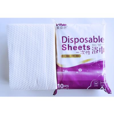 China Wholesale Large Sanitary Bath Towels For Nonwoven Envelope Towels Hotel Travel Guest Disposable Bath Towel for sale